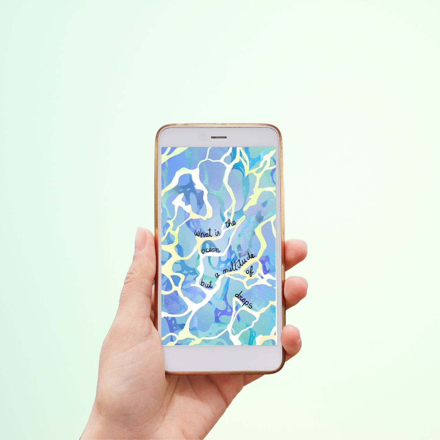 Hand holding a smartphone with an abstract ocean background.
